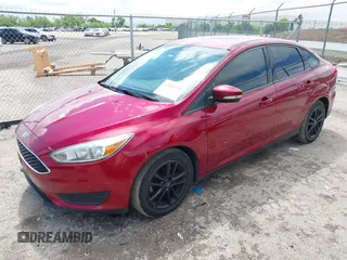 2017 Ford Focus SE z VIN 1FADP3F23HL313857, wystawiony jako IAAI lot #42181530 z przebiegiem 93 478 mil mil oraz . Historia ofert i sprzedaży dostępna na DreamBid. Obrazek 2.
