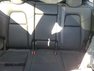 2024 Tesla Model Y z VIN 7SAYGDED4RF125330, wystawiony jako Copart lot #81385224 z przebiegiem 3 631 mil mil oraz Szkoda całkowita • Salvage title. Historia ofert i sprzedaży dostępna na DreamBid. Obrazek 10.