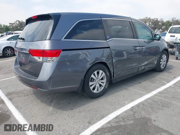 2014 Honda Odyssey EX-L with VIN 5FNRL5H64EB026520, listed as a IAAI auction lot 42562290 with 118,890 mi miles and . Bid and sale history available at DreamBid. Image 4.