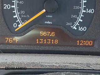 1997 Mercedes-Benz E-Class with VIN WDBJF72F8VA309745, listed as a IAAI auction lot 42119469 with 131,318 mi miles. Bid and sale history available at carsss.com. Image 7.