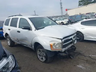 2004 Dodge Durango SLT with VIN 1D4HD48N44F217233, listed as a IAAI auction lot 41792773 with 105,741 mi miles. Bid and sale history available at carsss.com. Image 1.