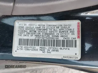 2002 Toyota Celica GTS with VIN JTDDY32T520060166, listed as a IAAI auction lot 41598643 with 116,983 mi miles. Bid and sale history available at carsss.com. Image 9.