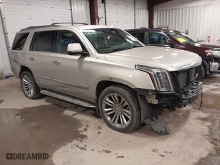 2017 Cadillac Escalade Premium Luxury with VIN 1GYS4CKJ9HR390988, listed as a IAAI auction lot 41626132 with 166,185 mi miles. Bid and sale history available at carsss.com. Image 1.