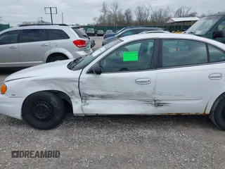 2005 Pontiac Grand Am SE with VIN 1G2NE52E95M191936, listed as a IAAI auction lot 41940665 with 247,461 mi miles. Bid and sale history available at carsss.com. Image 6.
