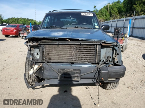 1998 Jeep Cherokee Sport with VIN 1J4FJ68S6WL283022, listed as a Copart auction lot 57451125 with 207,618 mi miles and Salvage title. Bid and sale history available at DreamBid. Image 5.