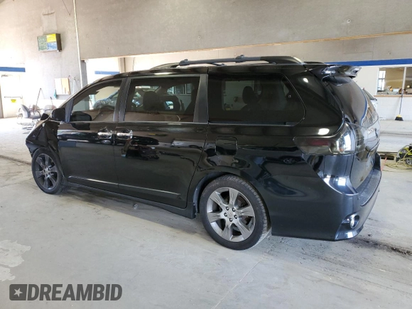 2014 Toyota Sienna SE with VIN 5TDXK3DC5ES418508, listed as a Copart auction lot 69742974 with 210,168 mi miles and Salvage Title. Bid and sale history available at DreamBid. Image 2.