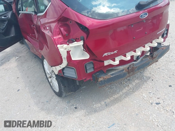 2017 Ford Focus Titanium with VIN 1FADP3N24HL294690, listed as a IAAI auction lot 39893510 with 123,089 mi miles and . Bid and sale history available at DreamBid. Image 14.