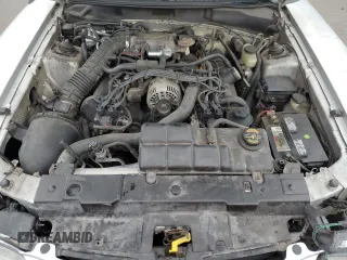 1998 Ford Mustang GT z VIN 1FAFP42XXWF229613, wystawiony jako Copart lot #63231905 z przebiegiem 65 669 mil mil oraz Szkoda całkowita • Salvage title. Historia ofert i sprzedaży dostępna na DreamBid. Obrazek 11.