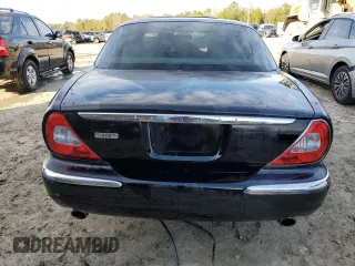 2007 Jaguar XJ with VIN SAJWA71B97SH18651, listed as a Copart auction lot 87690275 with 0 mi miles and Salvage Title. Bid and sale history available at carsss.com. Image 6.