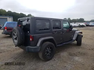 2018 Jeep Wrangler JK Unlimited Sahara with VIN 1C4HJWEG7JL909023, listed as a Copart auction lot 72774404 with 106,801 mi miles and Salvage Title. Bid and sale history available at carsss.com. Image 3.