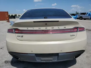 2014 Lincoln MKZ Hybrid z VIN 3LN6L2LU1ER821882, wystawiony jako Copart lot #62751275 z przebiegiem 260 413 mil mil oraz Nie do naprawy • Non repairable. Historia ofert i sprzedaży dostępna na DreamBid. Obrazek 6.