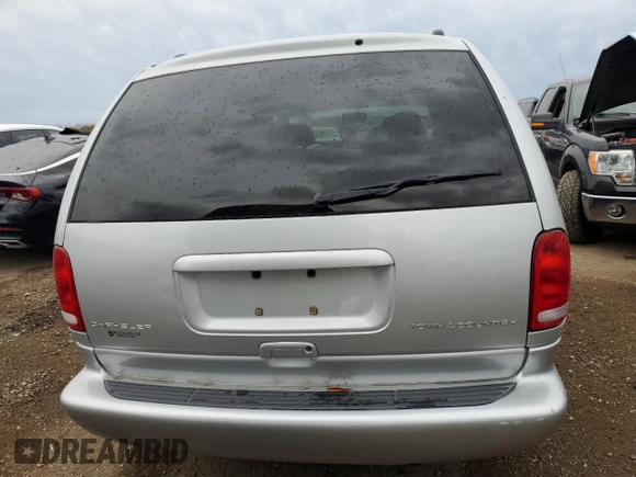 2000 Chrysler Town & Country LX z VIN 1C4GP44G5YB516136, wystawiony jako Copart lot #78693894 z przebiegiem 71 708 mil mil oraz Szkoda całkowita • Salvage title. Historia ofert i sprzedaży dostępna na DreamBid. Obrazek 6.