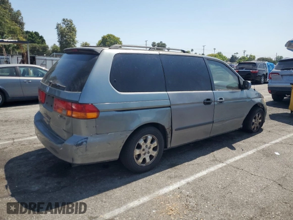 2002 Honda Odyssey EX-L with VIN 2HKRL189X2H530814, listed as a Copart auction lot 62280465 with 270,080 mi miles and Salvage title. Bid and sale history available at DreamBid. Image 3.