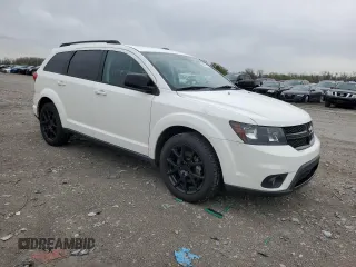 2017 Dodge Journey SXT with VIN 3C4PDCBG8HT545764, listed as a Copart auction lot 50450415 with 104,416 mi miles and Salvage Title. Bid and sale history available at carsss.com. Image 4.