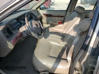 2001 Mercury Grand Marquis LS z VIN 2MEFM75W91X664545, wystawiony jako Copart lot #59572735 z przebiegiem 141 785 mil mil oraz Czysty tytuł • Clean title. Historia ofert i sprzedaży dostępna na DreamBid. Obrazek 7.