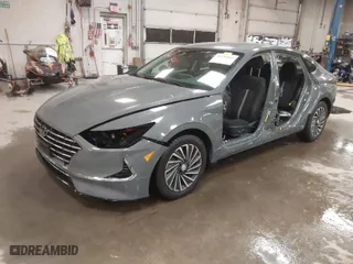 2022 Hyundai Sonata Hybrid SEL with VIN KMHL34JJ5NA047976, listed as a IAAI auction lot 41350961 with 25,063 mi miles. Bid and sale history available at carsss.com. Image 2.