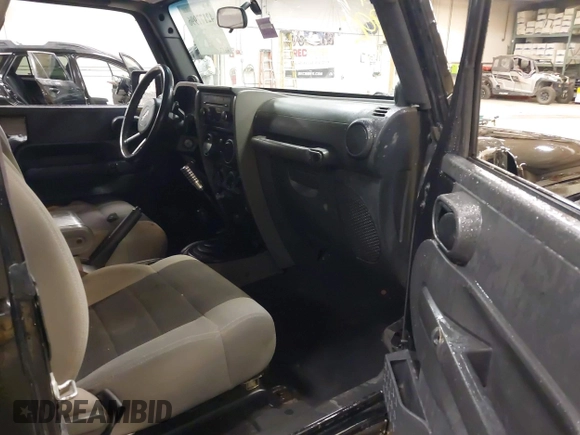 2007 Jeep Wrangler X with VIN 1J4FA24187L117446, listed as a IAAI auction lot 42177996 with 218,976 mi miles and . Bid and sale history available at DreamBid. Image 5.