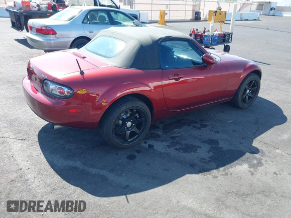 2006 Mazda MX-5 Miata Sport z VIN JM1NC25F260109008, wystawiony jako IAAI lot #42467176 z przebiegiem 139 839 mil mil oraz . Historia ofert i sprzedaży dostępna na DreamBid. Obrazek 4.