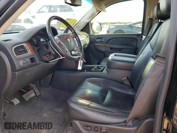 2014 Chevrolet Suburban LT with VIN 1GNSCJE03ER202873, listed as a Copart auction lot 85142854 with 213,850 mi miles and Salvage Title. Bid and sale history available at carsss.com. Image 7.