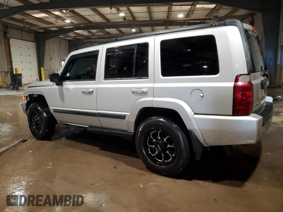 2009 Jeep Commander Sport z VIN 1J8HG48K09C526337, wystawiony jako Copart lot #89026135 z przebiegiem 194 514 mil mil oraz Szkoda całkowita • Salvage title. Historia ofert i sprzedaży dostępna na DreamBid. Obrazek 2.