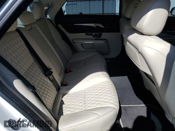 2016 Jaguar XJ Portfolio with VIN SAJWA2G70G8W01136, listed as a Copart auction lot 50120455 with 92,224 mi miles and Salvage title. Bid and sale history available at DreamBid. Image 10.