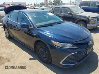 2021 Toyota Camry Hybrid LE with VIN 4T1C31AK5MU552226, listed as a IAAI auction lot 40210726 with 107,331 mi miles. Bid and sale history available at carsss.com. Image 1.