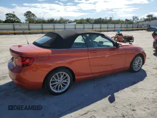 2016 BMW 2 Series 228i with VIN WBA1K9C50GV710942, listed as a Copart auction lot 77700934 with 28,643 mi miles and Salvage Title. Bid and sale history available at carsss.com. Image 3.