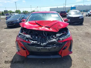 2021 Toyota Prius LE with VIN JTDKAMFP6M3192515, listed as a IAAI auction lot 42302003 with 74,247 mi miles and . Bid and sale history available at DreamBid. Image 12.