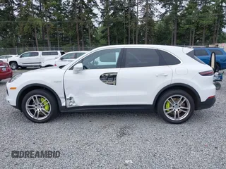 2019 Porsche Cayenne E-Hybrid z VIN WP1AE2AY0KDA52065, wystawiony jako IAAI lot #42687097 z przebiegiem 53 670 mil mil oraz . Historia ofert i sprzedaży dostępna na DreamBid. Obrazek 15.