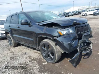 2015 Jeep Grand Cherokee Altitude z VIN 1C4RJFAG1FC128905, wystawiony jako IAAI lot #42156697 z przebiegiem 102 071 mil mil oraz . Historia ofert i sprzedaży dostępna na DreamBid. Obrazek 1.