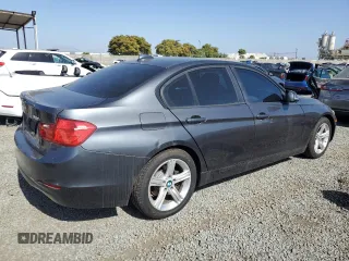 2013 BMW 3 Series 320i with VIN WBA3B1C58DK128983, listed as a Copart auction lot 61919185 with 155,698 mi miles and Clean title. Bid and sale history available at DreamBid. Image 3.