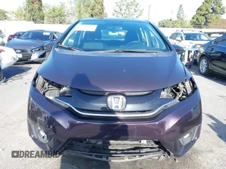 2016 Honda Fit EX with VIN JHMGK5H7XGS013097, listed as a IAAI auction lot 42290807 with 62,352 mi miles and . Bid and sale history available at DreamBid. Image 13.