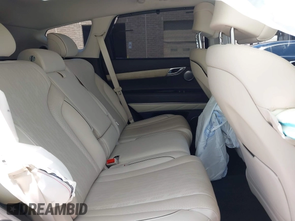 2023 Genesis GV80 with VIN KMUHBDSB8PU102875, listed as a IAAI auction lot 42370874 with 30,318 mi miles and . Bid and sale history available at DreamBid. Image 8.