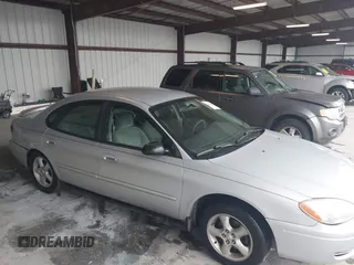 2006 Ford Taurus SE z VIN 1FAFP53U76A195301, wystawiony jako IAAI lot #42180556 z przebiegiem 180 599 mil mil oraz . Historia ofert i sprzedaży dostępna na DreamBid. Obrazek 13.