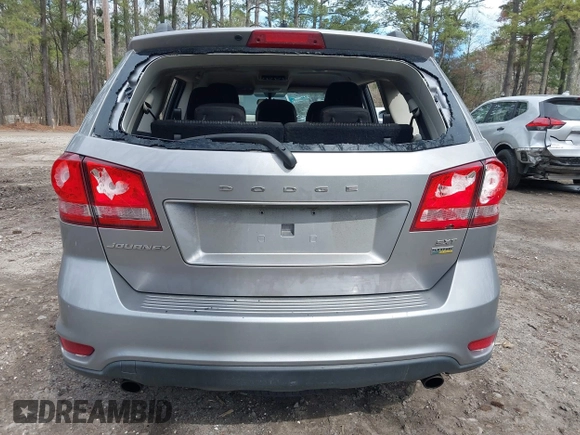 2015 Dodge Journey SXT with VIN 3C4PDCBG5FT696882, listed as a IAAI auction lot 41848362 with 175,039 mi miles and . Bid and sale history available at DreamBid. Image 16.