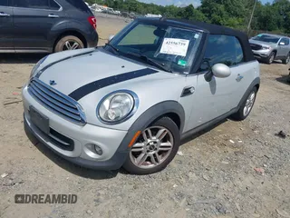 2012 MINI Convertible z VIN WMWZN3C51CT265186, wystawiony jako IAAI lot #42556739 z przebiegiem 118 747 mil mil oraz . Historia ofert i sprzedaży dostępna na DreamBid. Obrazek 2.