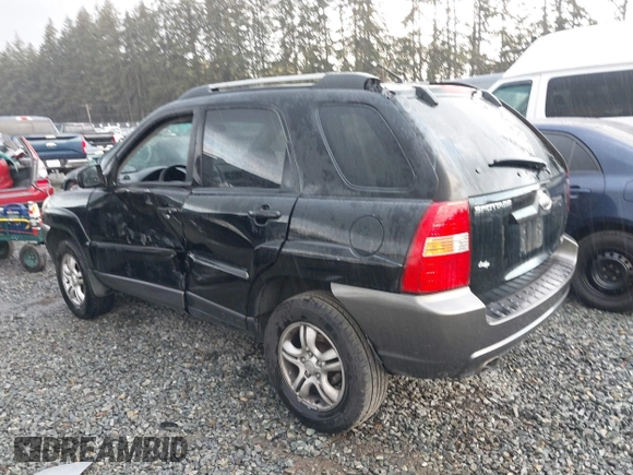 2005 Kia Sportage LX with VIN KNDJF723557054234, listed as a IAAI auction lot 40652851 with 220,215 mi miles and . Bid and sale history available at carsss.com. Image 3.