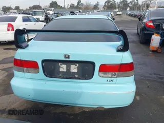 1998 Honda Civic HX with VIN 1HGEJ7127WL127977, listed as a IAAI auction lot 41230187 with 182,000 mi miles. Bid and sale history available at carsss.com. Image 17.