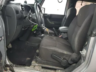 2013 Jeep Wrangler Sport with VIN 1C4AJWAG5DL591897, listed as a Copart auction lot 63218025 with 81,250 mi miles and Clean title. Bid and sale history available at DreamBid. Image 7.