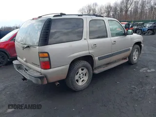 2005 Chevrolet Tahoe LS z VIN 1GNEK13T05J197479, wystawiony jako IAAI lot #41693575 z przebiegiem 124 537 mil mil oraz . Historia ofert i sprzedaży dostępna na DreamBid. Obrazek 4.