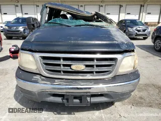 2000 Ford F-150 with VIN 2FTRX18W0YCA13563, listed as a Copart auction lot 55809785 with Not provided miles and Non repairable. Bid and sale history available at DreamBid. Image 5.