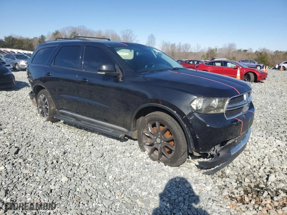2012 Dodge Durango Crew with VIN 1C4SDHDT1CC100109, listed as a Copart auction lot 41647185 with 215,698 mi miles and Salvage Title. Bid and sale history available at carsss.com. Image 4.
