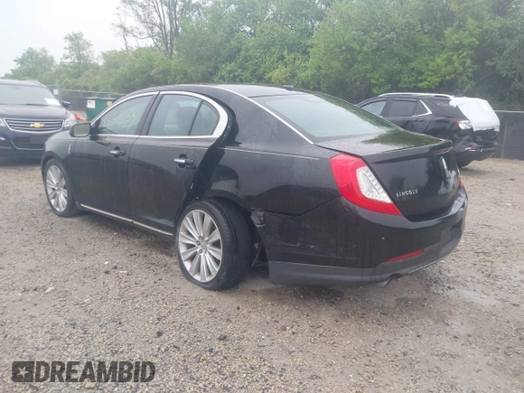 2013 Lincoln MKS EcoBoost with VIN 1LNHL9FT4DG607785, listed as a IAAI auction lot 42279833 with 126,548 mi miles and . Bid and sale history available at DreamBid. Image 3.