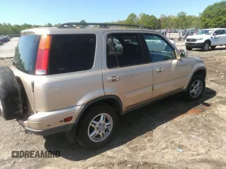 2000 Honda CR-V SE with VIN JHLRD1875YS012621, listed as a IAAI auction lot 42027584 with 211,710 mi miles. Bid and sale history available at carsss.com. Image 4.