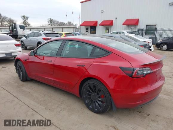 2022 Tesla Model 3 Performance with VIN 5YJ3E1ECXNF329188, listed as a IAAI auction lot 41308371 with 15,220 mi miles and . Bid and sale history available at DreamBid. Image 3.