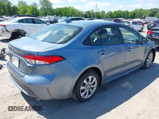 2021 Toyota Corolla LE with VIN JTDEPMAE7MJ144664, listed as a IAAI auction lot 42269698 with 23,500 mi miles and . Bid and sale history available at DreamBid. Image 4.