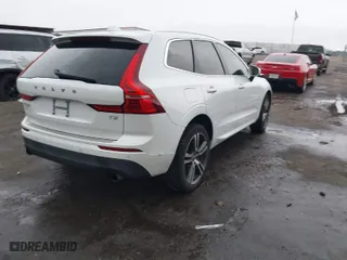 2019 Volvo XC60 Momentum with VIN LYV102DK9KB319379, listed as a IAAI auction lot 41136600 with 73,063 mi miles. Bid and sale history available at carsss.com. Image 4.