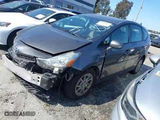 2016 Toyota Prius v Two with VIN JTDZN3EU0GJ047104, listed as a IAAI auction lot 41459476 with 210,453 mi miles. Bid and sale history available at carsss.com. Image 18.