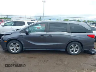 2018 Honda Odyssey EX-L z VIN 5FNRL6H74JB043276, wystawiony jako IAAI lot #42326742 z przebiegiem 126 025 mil mil oraz . Historia ofert i sprzedaży dostępna na DreamBid. Obrazek 14.