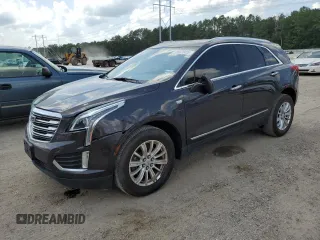 2017 Cadillac XT5 FWD with VIN 1GYKNARS0HZ289192, listed as a Copart auction lot 58078485 with 104,077 mi miles and Salvage title. Bid and sale history available at DreamBid. Image 1.
